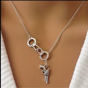 Silver Handcuff and Gun Pendant Necklace